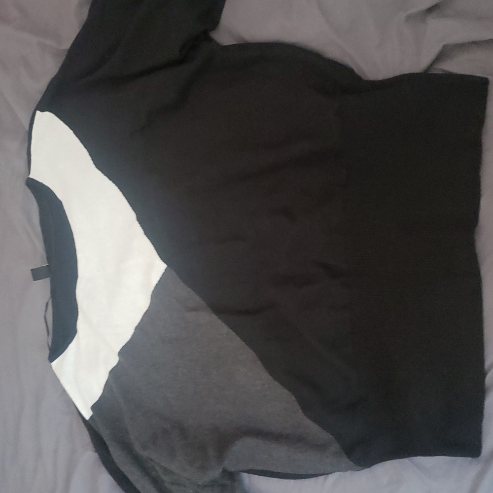 Brand New bat wing sweater with a fitted bottom.